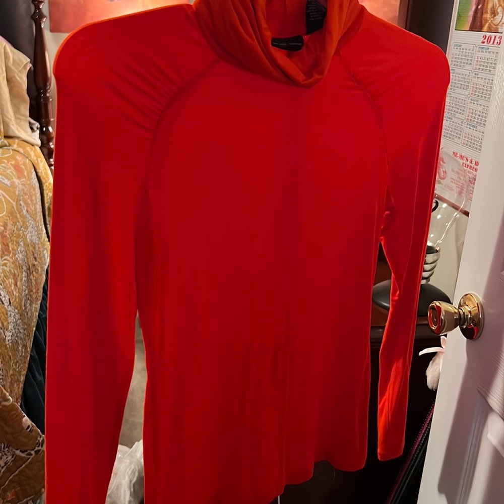 Red/orange turtle neck long sleeve shirt